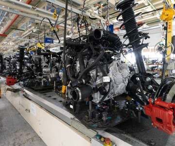 Transmissions and automotive powertrain assemblies